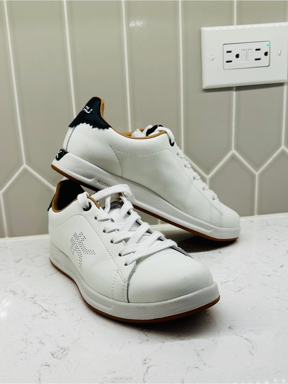 KURU Women’s White Leather Sneakers with Tan Lining and Black Heel Accent